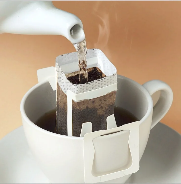 100Pcs / Pack Drip Coffee Cup Filter Bags Hanging Cup Coffee Filters Coffee and Tea Tools
100Pcs / Pack Drip Coffee Cup Filter Bags Hanging Cup Coffee Filters Coffee and Tea Tools