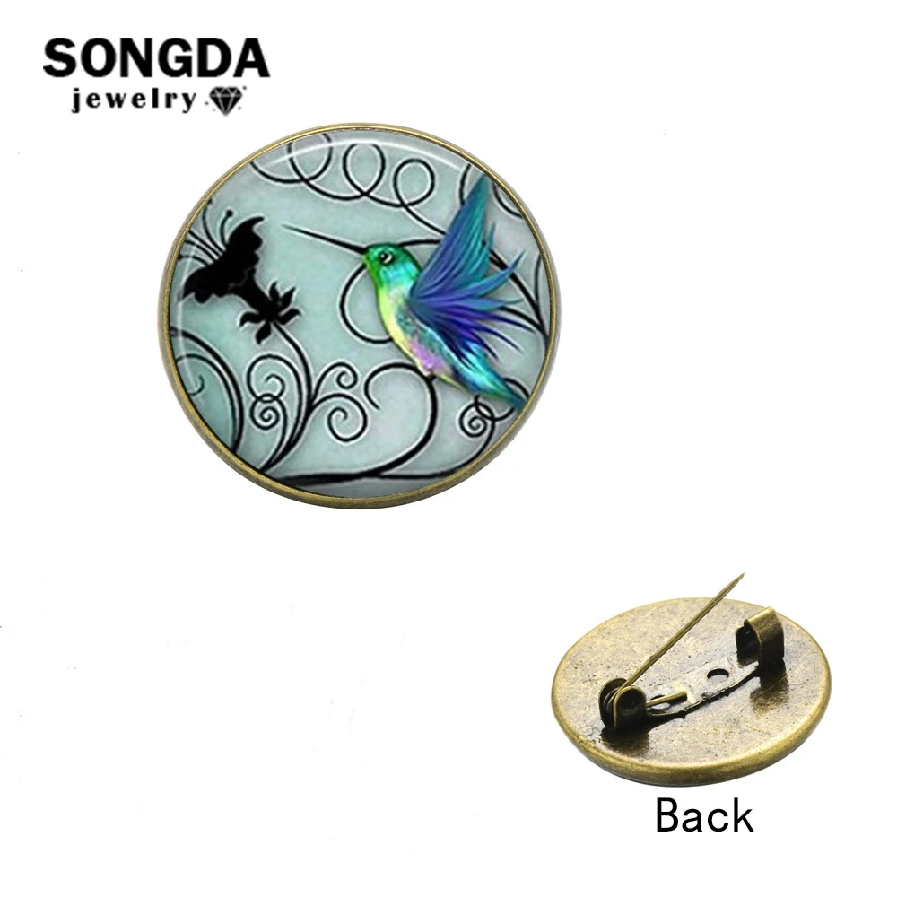 SONGDA Blue Hummingbird Brooches for Women Birds Little Animal Art Painting Glass Round Pins Button for Coat Banquet Accessories
SONGDA Blue Hummingbird Brooches for Women Birds Little Animal Art Painting Glass Round Pins Button for Coat Banquet Accessories