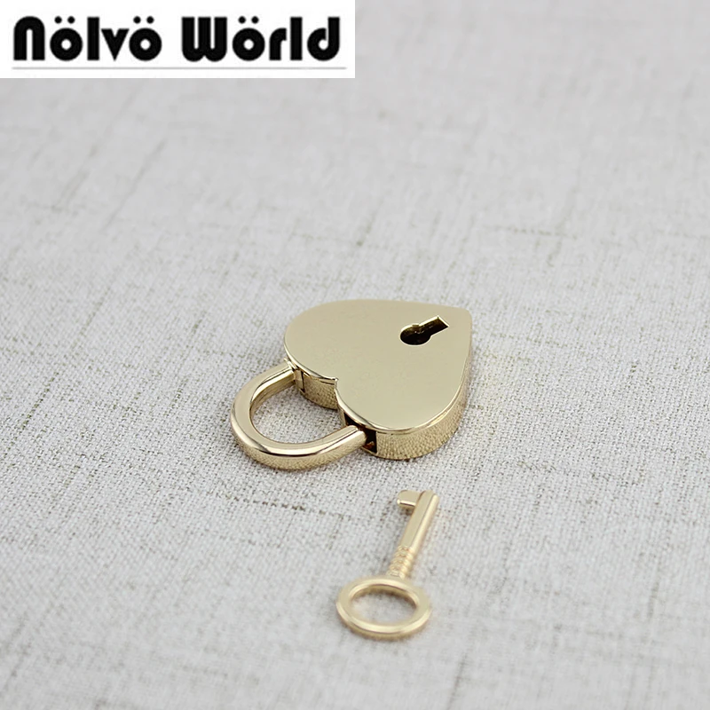 5 sets 4*3cm light gold loving pad lock and key,Heart Shaped lock fasten closure for ladies purse box bags sewing
5 sets 4*3cm light gold loving pad lock and key,Heart Shaped lock fasten closure for ladies purse box bags sewing