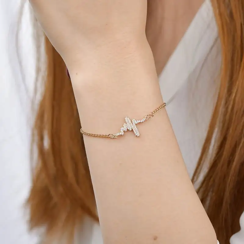 KobitAce Creative electrocardiogram gold cross bracelets for women Fashion alloy Small gifts given to each other gifts bracelet
KobitAce Creative electrocardiogram gold cross bracelets for women Fashion alloy Small gifts given to each other gifts bracelet