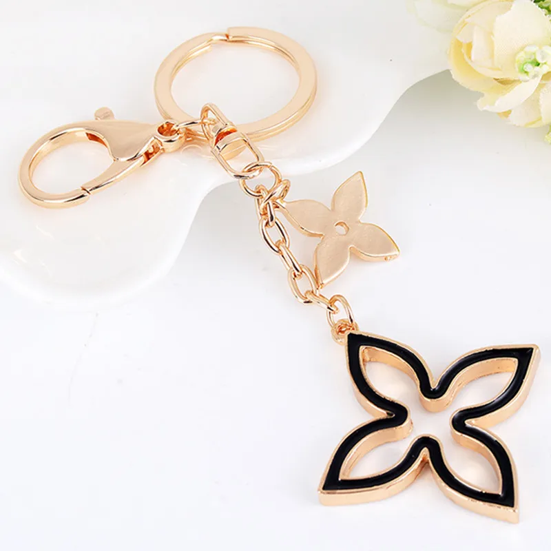 Creative crystal flower car keychain charm pendant fashion exquisite women's bags hang personalized key ring
Creative crystal flower car keychain charm pendant fashion exquisite women's bags hang personalized key ring