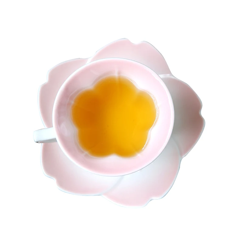 Luxury Coffee Set Ceramic Sakura Shaped Afternoon Tea Cups and Saucers Royal Bone China Coffee Cup Porcelain Drinkware Set
Luxury Coffee Set Ceramic Sakura Shaped Afternoon Tea Cups and Saucers Royal Bone China Coffee Cup Porcelain Drinkware Set