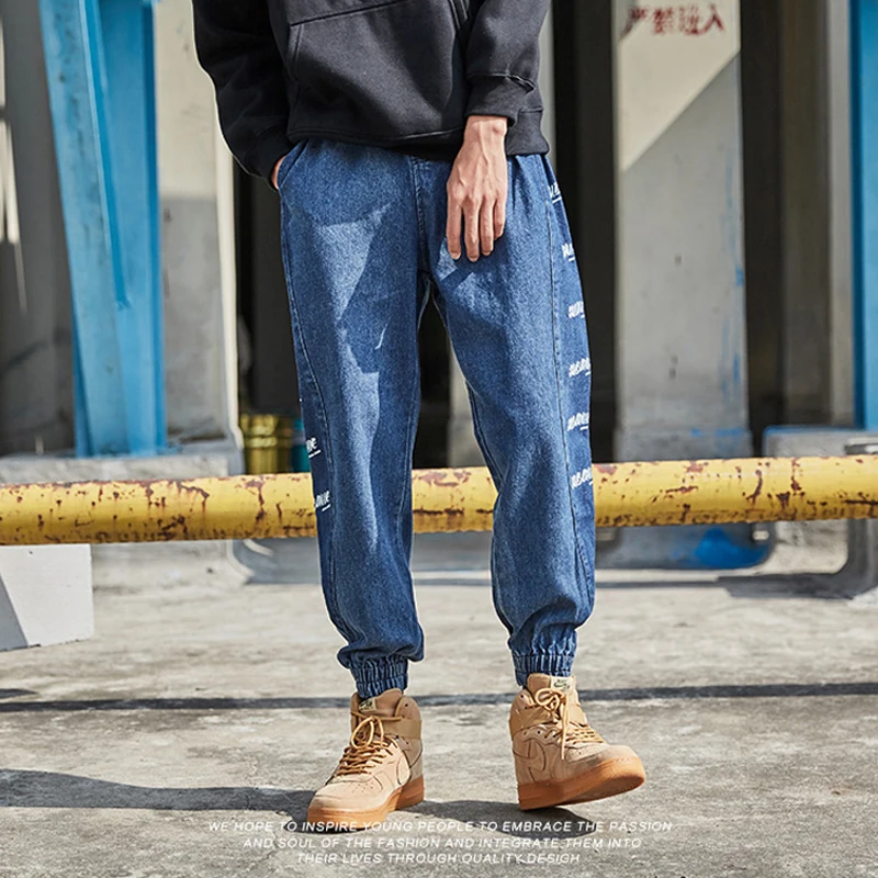 Fashion Streetwear Men Jeans Loose Fit Denim Cargo Pants Harem Trousers Printed Designer Hip Hop Jeans Men Slack Bottom Joggers
Fashion Streetwear Men Jeans Loose Fit Denim Cargo Pants Harem Trousers Printed Designer Hip Hop Jeans Men Slack Bottom Joggers
