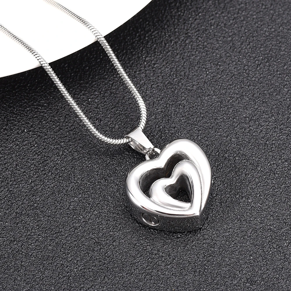 IJD12431 Double Heart Shaped Stainless Steel Cremation Pendant for Ashes Urn Souvenir Necklace Men Women Keepsake Jewelry
IJD12431 Double Heart Shaped Stainless Steel Cremation Pendant for Ashes Urn Souvenir Necklace Men Women Keepsake Jewelry