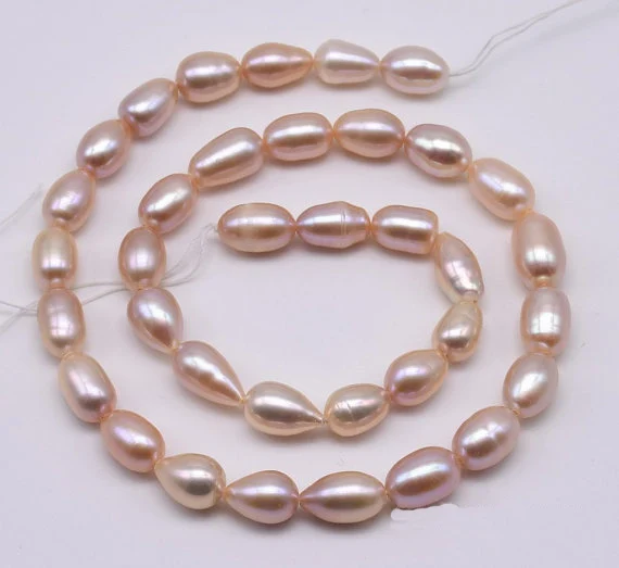 Rice Pearl Loose Beads,7-8mm Natural Purple Real Freshwater Pearl Jewellery,15inches One Full Strand
Rice Pearl Loose Beads,7-8mm Natural Purple Real Freshwater Pearl Jewellery,15inches One Full Strand
