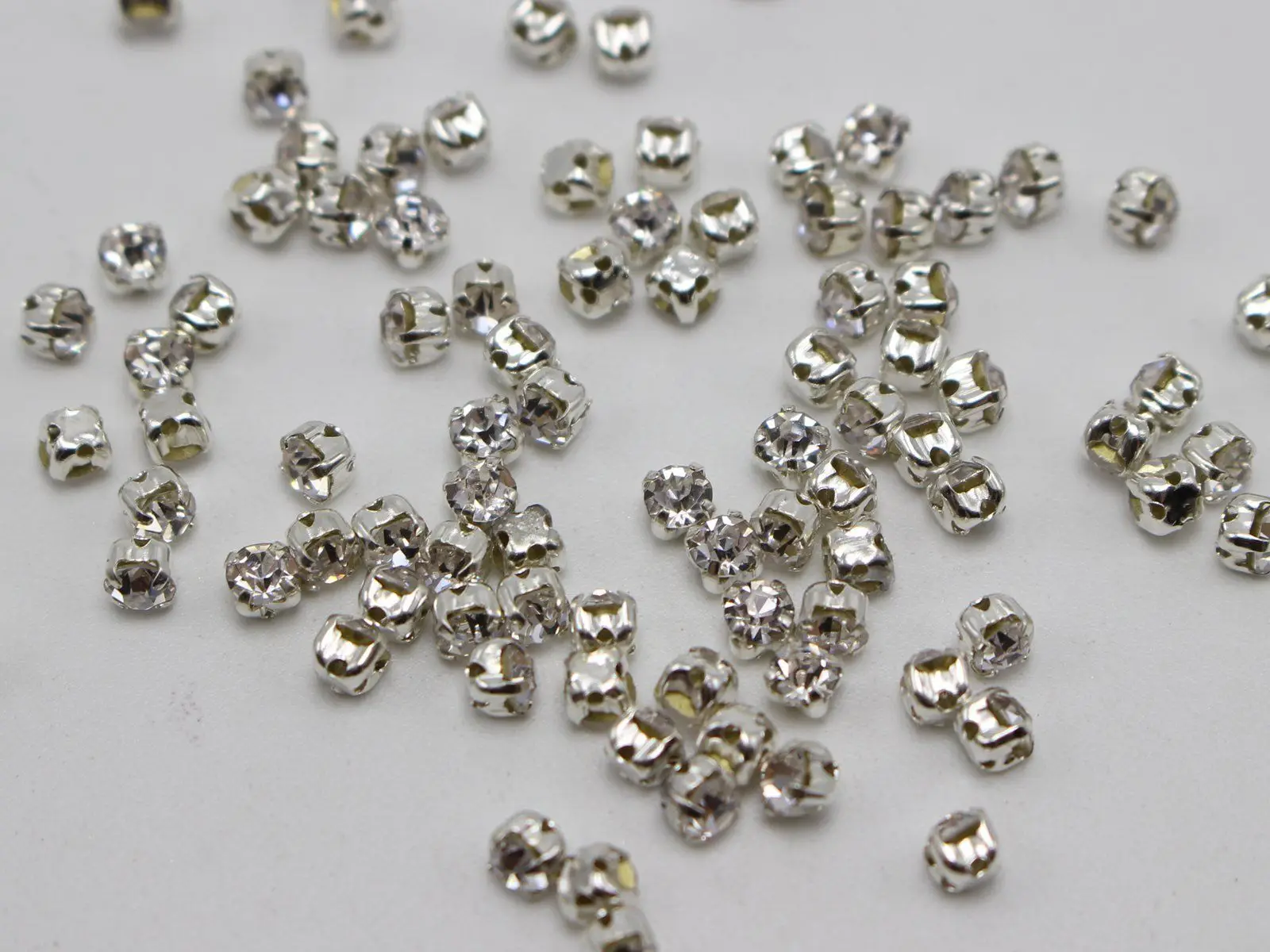 288 Silver Colour Colour Clear Crystal Glass Rose Montees 3mm SS12 Sew on Rhinestones Beads
288 Silver Colour Colour Clear Crystal Glass Rose Montees 3mm SS12 Sew on Rhinestones Beads
