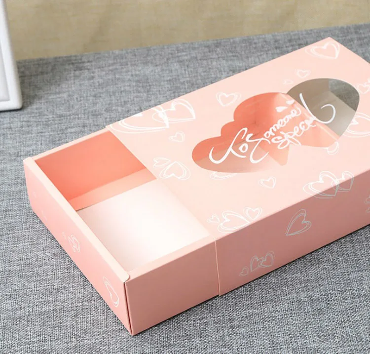 50PCS Wedding Gift Box Party Favor Drawer Paper Box With Window Heart Pink Snacks Cookie Candy Cup Cake Boxes And Packaging
50PCS Wedding Gift Box Party Favor Drawer Paper Box With Window Heart Pink Snacks Cookie Candy Cup Cake Boxes And Packaging