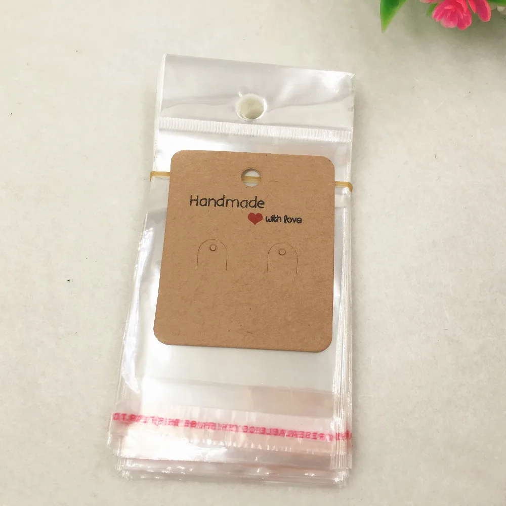 Серьги из крафт-бумаги, ювелирные открытки + 50 шт., прозрачные Opp пакеты дюйма, 6x5 см, для ручной работы, с надписью «любовь», подвеска, подвеска, карта
Серьги из крафт-бумаги, ювелирные открытки + 50 шт., прозрачные Opp пакеты дюйма, 6x5 см, для ручной работы, с надписью «любовь», подвеска, подвеска, карта