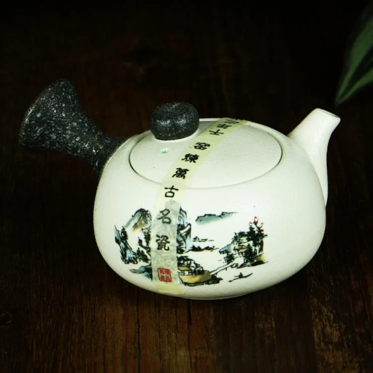 Snowflake glazed side of the pot to the pot fast pot pottery Kung Fu tea with hand grasping pot of tea teapot
Snowflake glazed side of the pot to the pot fast pot pottery Kung Fu tea with hand grasping pot of tea teapot