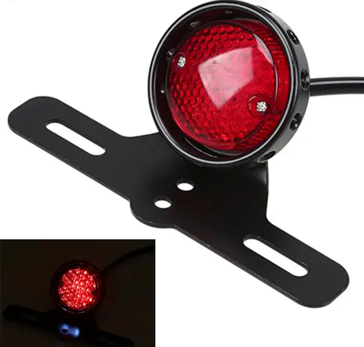 Motorcycle LED Retro Red Rear Tail Brake Stop Light Lamp W/ License Plate Mount for Harley Honda Suzuki Chopper Bobber
Motorcycle LED Retro Red Rear Tail Brake Stop Light Lamp W/ License Plate Mount for Harley Honda Suzuki Chopper Bobber