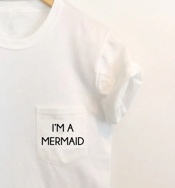 Женская футболка с надписью I'm A Mermaid Pocket, рубашка с надписью Tumblr, модные топы для инстаграма, милая футболка с карманом русалки, повседневные ...
Женская футболка с надписью I'm A Mermaid Pocket, рубашка с надписью Tumblr, модные топы для инстаграма, милая футболка с карманом русалки, повседневные ...