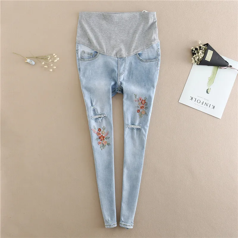 976# Embroidery Flower Denim Maternity Jeans Summer Light Blue Ripped Hole Pencil Pregnancy Trousers Clothes for Pregnant Women
976# Embroidery Flower Denim Maternity Jeans Summer Light Blue Ripped Hole Pencil Pregnancy Trousers Clothes for Pregnant Women