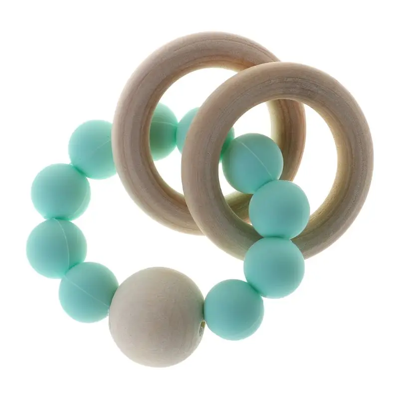 New Teether Bracelet Teething Chew Bite Newborn Teeth Care Beads Jewelry Pain Relief Silicone Wood Rings Infant Multi-functional
New Teether Bracelet Teething Chew Bite Newborn Teeth Care Beads Jewelry Pain Relief Silicone Wood Rings Infant Multi-functional