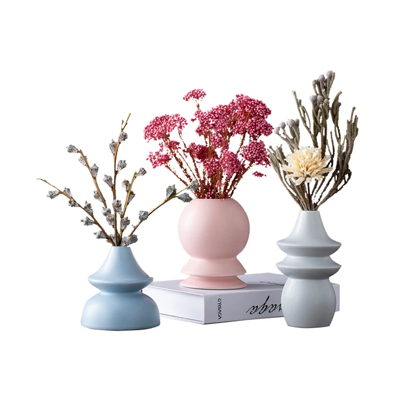 New Modern minimalist ceramic vase home decoration accessories Mini Flower vases Origami flower pot creative wedding gifts
New Modern minimalist ceramic vase home decoration accessories Mini Flower vases Origami flower pot creative wedding gifts