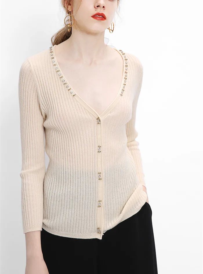 high quality 100%wool knitted women's fashion crystal beads cardigan sweater 3quarter-sleeve beige M/L
high quality 100%wool knitted women's fashion crystal beads cardigan sweater 3quarter-sleeve beige M/L