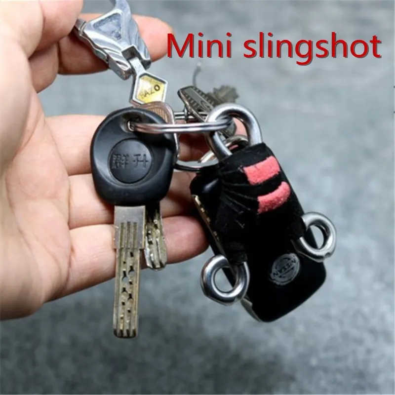 1pc Mini Manual Slingshot 6.5x5.5 cm Pendant Decorated Miniature Lightweight Stainless Steel Slingshot
1pc Mini Manual Slingshot 6.5x5.5 cm Pendant Decorated Miniature Lightweight Stainless Steel Slingshot