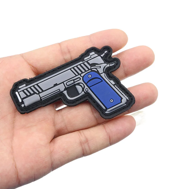 Pistol Shape Pvc Drop Rubber Military Tactics Denim Jacket Headband Moral Clothing Stitching Sticker Shoulder Logo Decoration
Pistol Shape Pvc Drop Rubber Military Tactics Denim Jacket Headband Moral Clothing Stitching Sticker Shoulder Logo Decoration