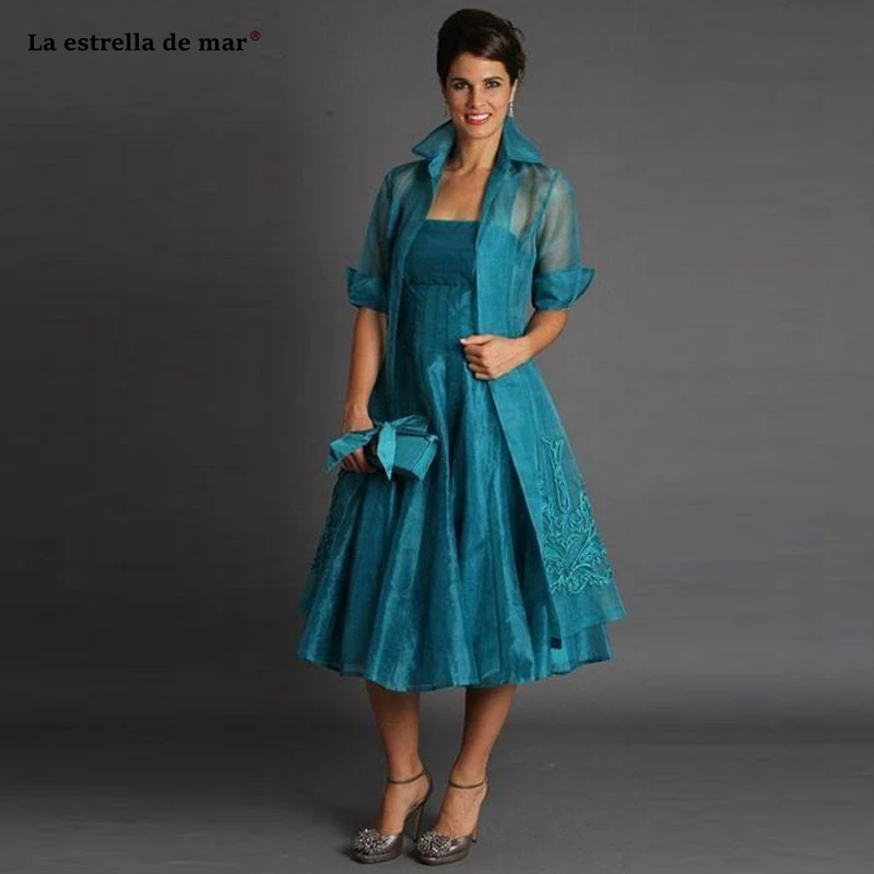 Wedding guest gown new organza embroidered long sleeve ALine2 pieces peacock blue mother of the bride Tea Length dinner dress
Wedding guest gown new organza embroidered long sleeve ALine2 pieces peacock blue mother of the bride Tea Length dinner dress