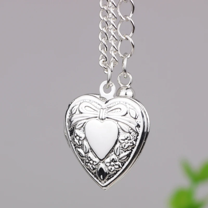 N125 Birthday gift flocket necklace bow knot pattern double heart pendant necklace
N125 Birthday gift flocket necklace bow knot pattern double heart pendant necklace
