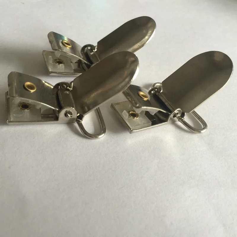NEW 50 pcs/lot 25mm Dotted Metal Suspender Paci Pacifier Ribbon Clips Hook Holder with Plastic Insert for Craft Project
NEW 50 pcs/lot 25mm Dotted Metal Suspender Paci Pacifier Ribbon Clips Hook Holder with Plastic Insert for Craft Project