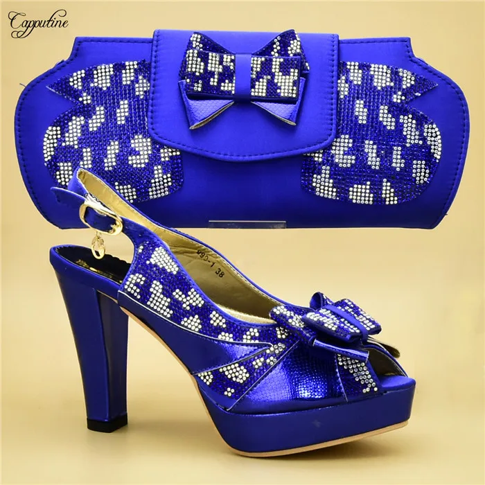 Most popular party set matching high heel shoes and bag set with rhinestones for wedding/party 999-1 in gold
Most popular party set matching high heel shoes and bag set with rhinestones for wedding/party 999-1 in gold