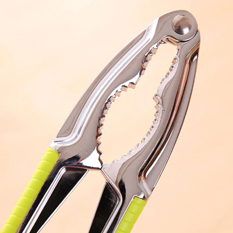 Multifunction Non-slip handle Almond Walnut Pecan Crack Hazelnut Hazel Filbert Nut Kitchen Nutcracker Sheller Clip Tool Clamp
Multifunction Non-slip handle Almond Walnut Pecan Crack Hazelnut Hazel Filbert Nut Kitchen Nutcracker Sheller Clip Tool Clamp