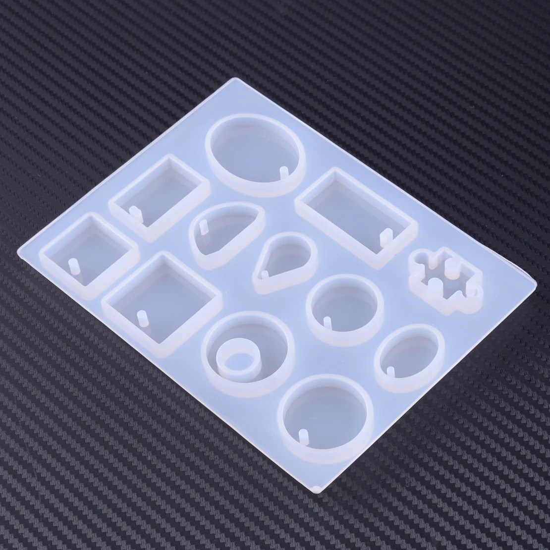 12 Holes Crystal Silicone Mold DIY Making Mould Resin Hand Craft for Necklace Pendant Jewelry
12 Holes Crystal Silicone Mold DIY Making Mould Resin Hand Craft for Necklace Pendant Jewelry