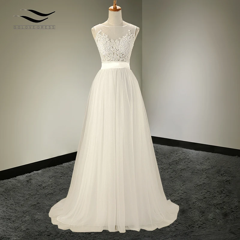 Tulle Floor-Length A-line O-Neck Wedding dress with Sash Sleeveless Lace and Button Bridal Gown Custom made Real Photos SL-W111
Tulle Floor-Length A-line O-Neck Wedding dress with Sash Sleeveless Lace and Button Bridal Gown Custom made Real Photos SL-W111
