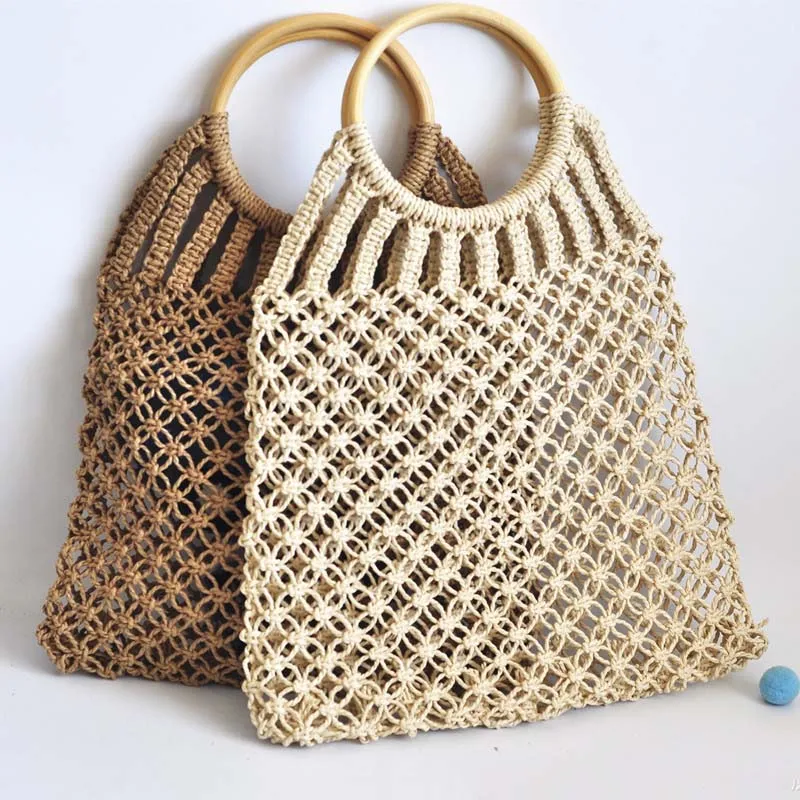 2019 Hand-Knitted Hollow Handbag Round Wooden Ring Handle Straw Bag Women Shopping Bag Cotton Rope Net Pocket Holiday Beach Bag
2019 Hand-Knitted Hollow Handbag Round Wooden Ring Handle Straw Bag Women Shopping Bag Cotton Rope Net Pocket Holiday Beach Bag