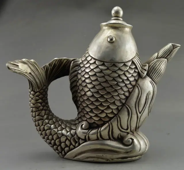 Elaborate Chinese Collectible Decorated Old Handwork Tibetan Silver Big Fish Auspicious Tea Pot
Elaborate Chinese Collectible Decorated Old Handwork Tibetan Silver Big Fish Auspicious Tea Pot