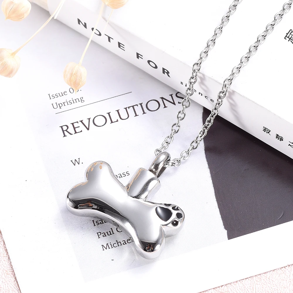 Pet Paw Print Bone Shape Urn Pendant Memorial Ashes Keepsake Stainless steel Cremation Jewelry
Pet Paw Print Bone Shape Urn Pendant Memorial Ashes Keepsake Stainless steel Cremation Jewelry