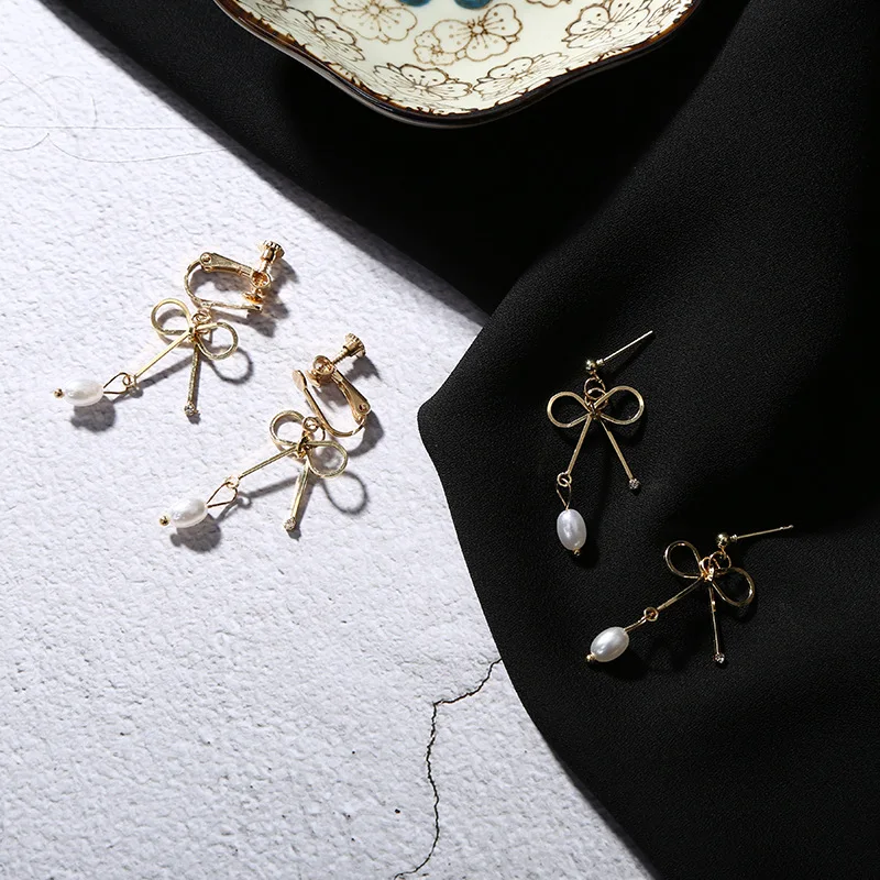 Golden Metallic Bow Knot Simulated Pearl Clip Stud Women Drop Earrings Dangle Earrings
Golden Metallic Bow Knot Simulated Pearl Clip Stud Women Drop Earrings Dangle Earrings