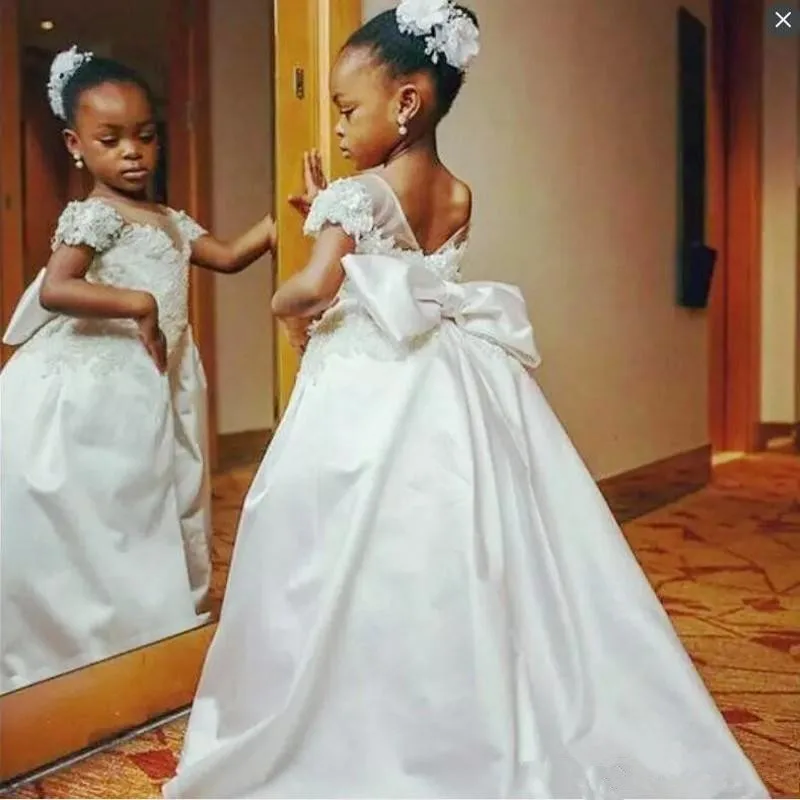 African Flower Girls Dresses Back With Big Bow A Line Satin Girls Pageant Dress For Kids Formal Wear Cap Sleeves Kids Party Gown
African Flower Girls Dresses Back With Big Bow A Line Satin Girls Pageant Dress For Kids Formal Wear Cap Sleeves Kids Party Gown