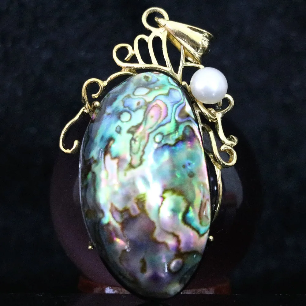 Natural popular abalone shell 32x49mm oval pedant pearl beads gold-color Xmas gift jewelry B1109
Natural popular abalone shell 32x49mm oval pedant pearl beads gold-color Xmas gift jewelry B1109
