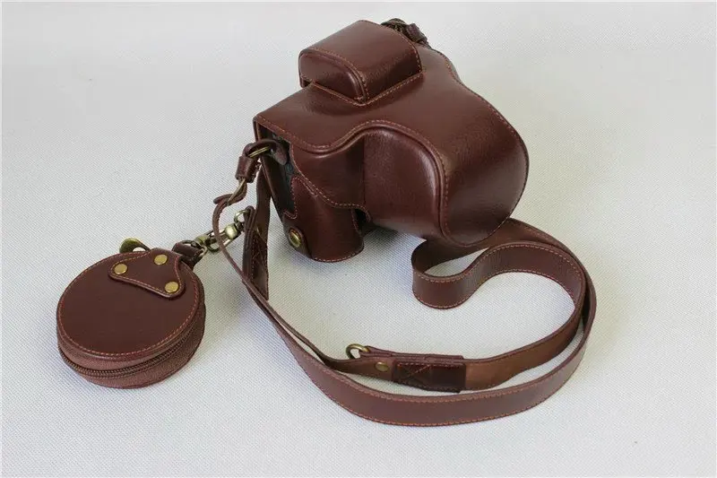 New Genuine Real Leather Camera Bag Cover Case For Canon EOS M5 EOSM5 (15-45mm) lens with Bottom Opening Design
New Genuine Real Leather Camera Bag Cover Case For Canon EOS M5 EOSM5 (15-45mm) lens with Bottom Opening Design