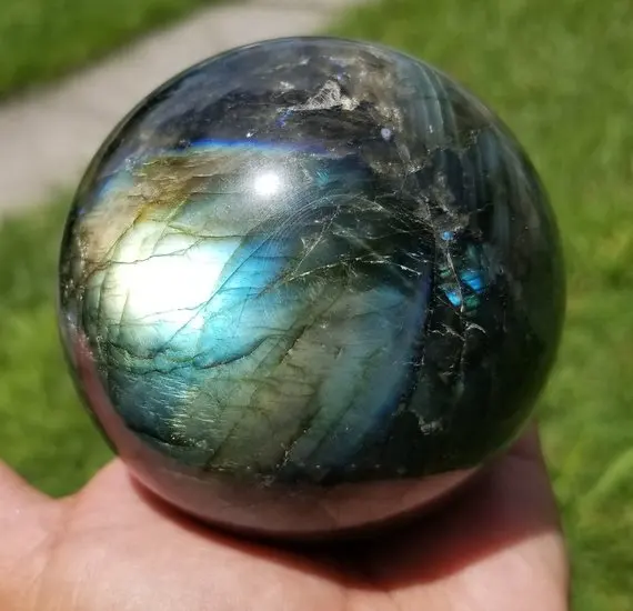 about 70mm beautiful Rare Spectrolite Labradorite Crystal Polished Sphere with good flash wholesale
about 70mm beautiful Rare Spectrolite Labradorite Crystal Polished Sphere with good flash wholesale