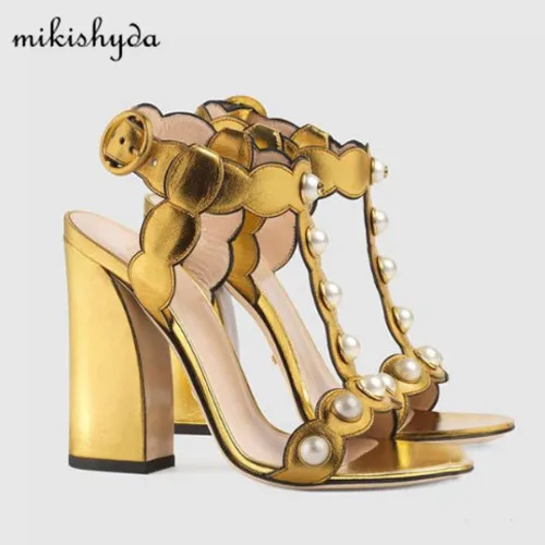 2017 new leather gold sandals pearl stud thick high heels word buckle leaves side shoes spring and summer shoes
2017 new leather gold sandals pearl stud thick high heels word buckle leaves side shoes spring and summer shoes