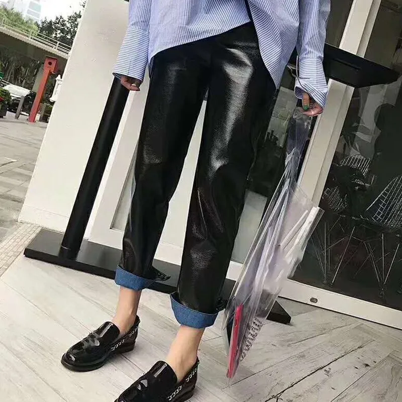 TWOTWINSTYLE PU Leather Trousers For Women Zipper Button High Waist Loose Straight Pants Female 2020 Autumn Fashion New
TWOTWINSTYLE PU Leather Trousers For Women Zipper Button High Waist Loose Straight Pants Female 2020 Autumn Fashion New