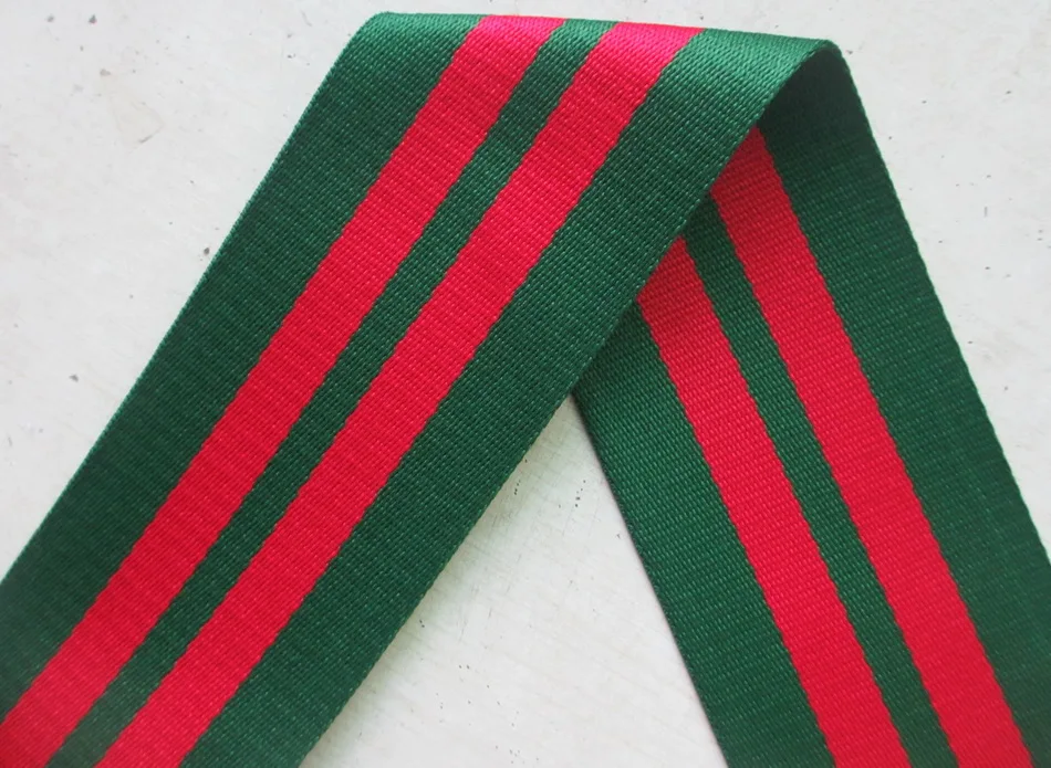 Thicker width 75mm 10M/lot polyester tough Woven Jacquard Ribbon green background ribbon
Thicker width 75mm 10M/lot polyester tough Woven Jacquard Ribbon green background ribbon