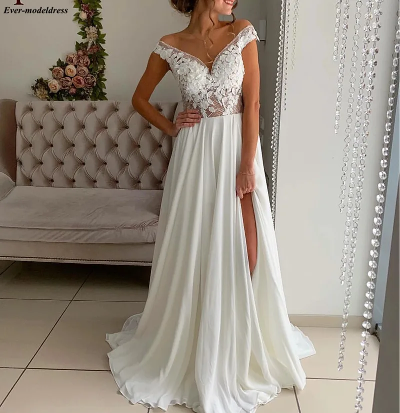 Boho Wedding Dresses 2021 Beach Bridal Gowns Side Split Appliques Beaded Sheer O-Neck Plus Size Bride Dresses Vestido De Noiva
Boho Wedding Dresses 2021 Beach Bridal Gowns Side Split Appliques Beaded Sheer O-Neck Plus Size Bride Dresses Vestido De Noiva