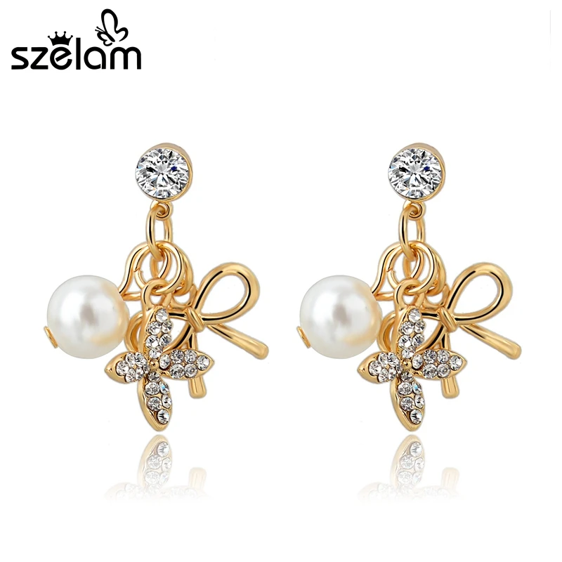 MELIHE Crystal Bowknot Statement Earrings Gold Simulated Pearl Stud Earrings For Women Vintage Bridal Wedding Jewelry SER150050
MELIHE Crystal Bowknot Statement Earrings Gold Simulated Pearl Stud Earrings For Women Vintage Bridal Wedding Jewelry SER150050