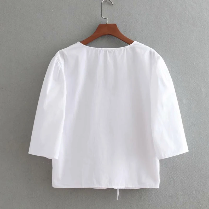 Solid White Puff Half Sleeve Loose Front Lace Up Hollow Out Sexy Top T-shirt French Style Deep V-neck Top T-shirt
Solid White Puff Half Sleeve Loose Front Lace Up Hollow Out Sexy Top T-shirt French Style Deep V-neck Top T-shirt