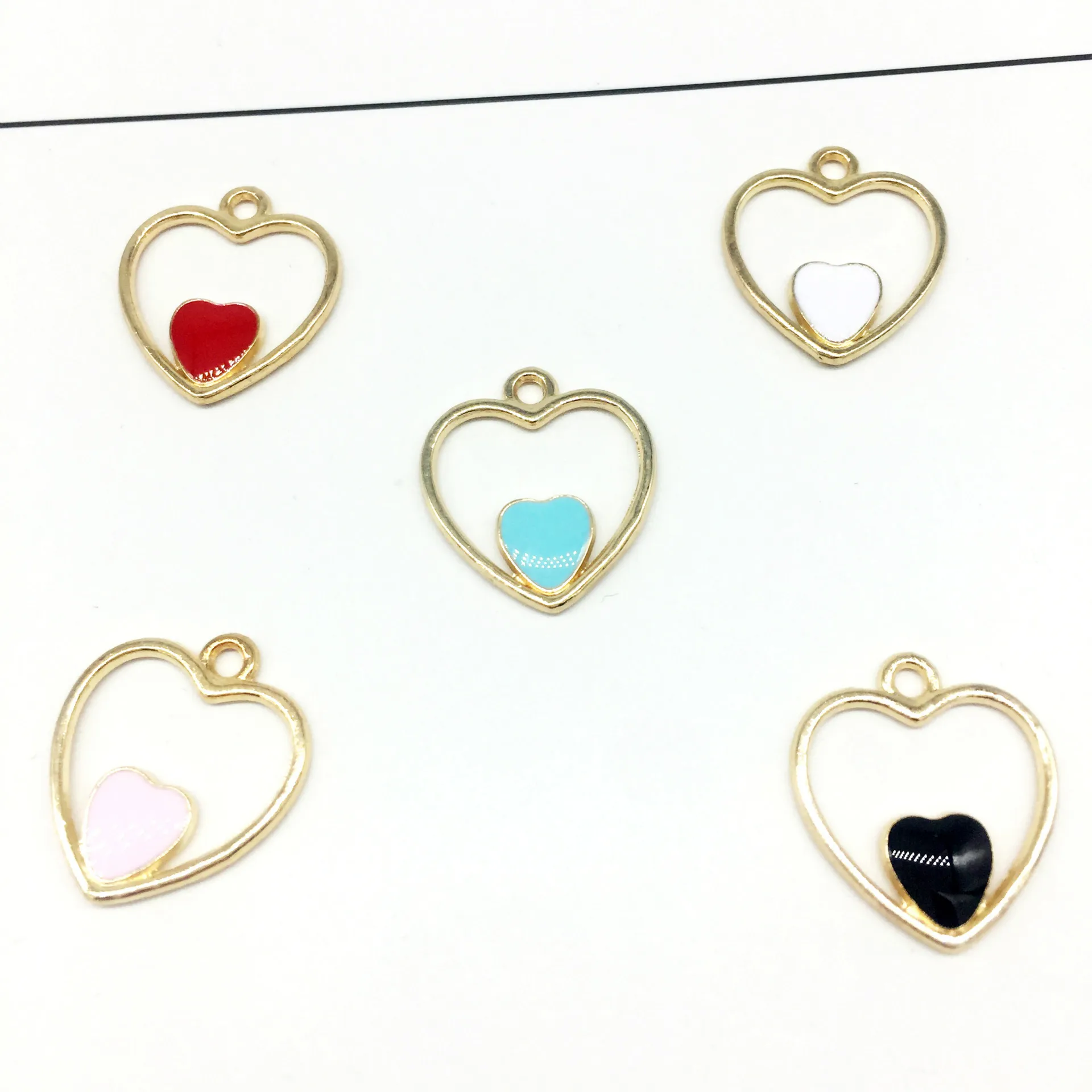 50pcs/lot Gold Color Metal Alloy Various Colors Oil Drop Geometry Hollow Heart Charms For DIY Handmade Jewelry
50pcs/lot Gold Color Metal Alloy Various Colors Oil Drop Geometry Hollow Heart Charms For DIY Handmade Jewelry