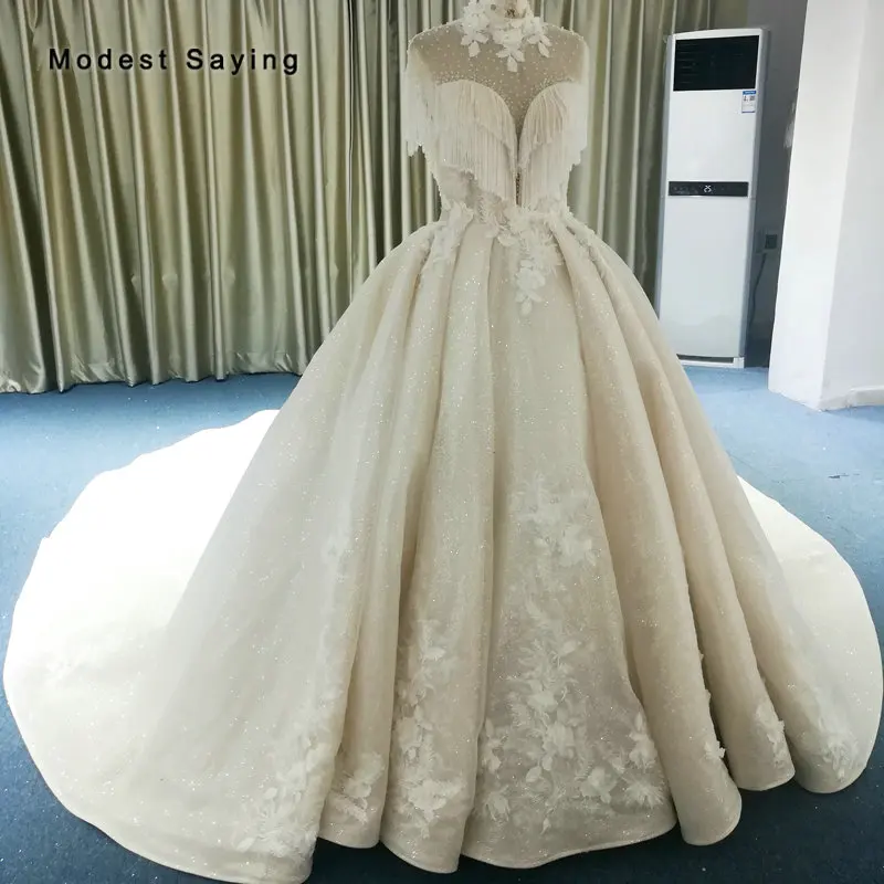 Princess Ivory Ball Gown Beaded Tassel Short Sleeves Lace Wedding Dresses 2019 with Cathedral Train Sexy Backless Bridal Gowns
Princess Ivory Ball Gown Beaded Tassel Short Sleeves Lace Wedding Dresses 2019 with Cathedral Train Sexy Backless Bridal Gowns