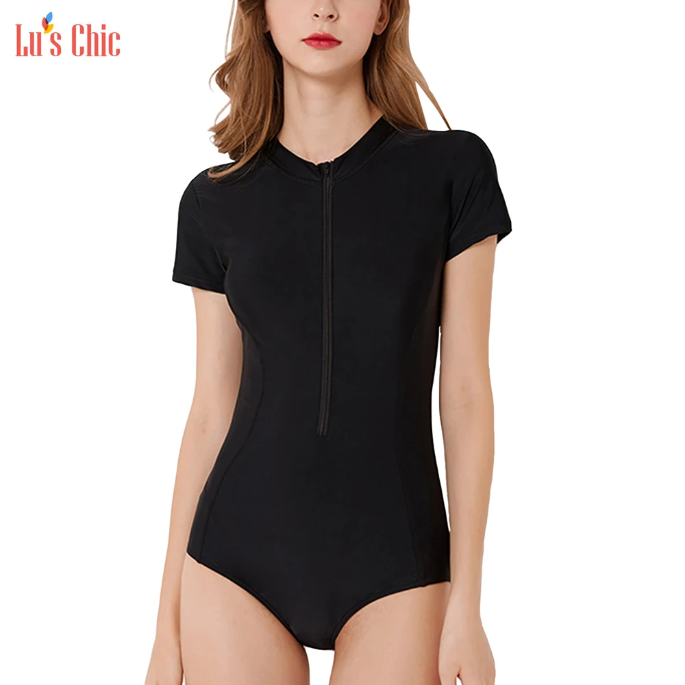 Lu's Chic Short Sleeve Triangle Bottom Surf Swimsuit Women Zip Rash Guard One Piece Bathing Suit
Lu's Chic Short Sleeve Triangle Bottom Surf Swimsuit Women Zip Rash Guard One Piece Bathing Suit
