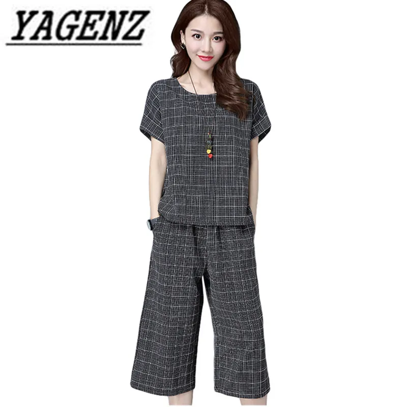 Summer Short-sleeved 2 piece set Ladies Clothing Sets 2020 Loose Plaid O neck Tops+Pants 2 piece sets Casual Women Suit Sets 5XL
Summer Short-sleeved 2 piece set Ladies Clothing Sets 2020 Loose Plaid O neck Tops+Pants 2 piece sets Casual Women Suit Sets 5XL