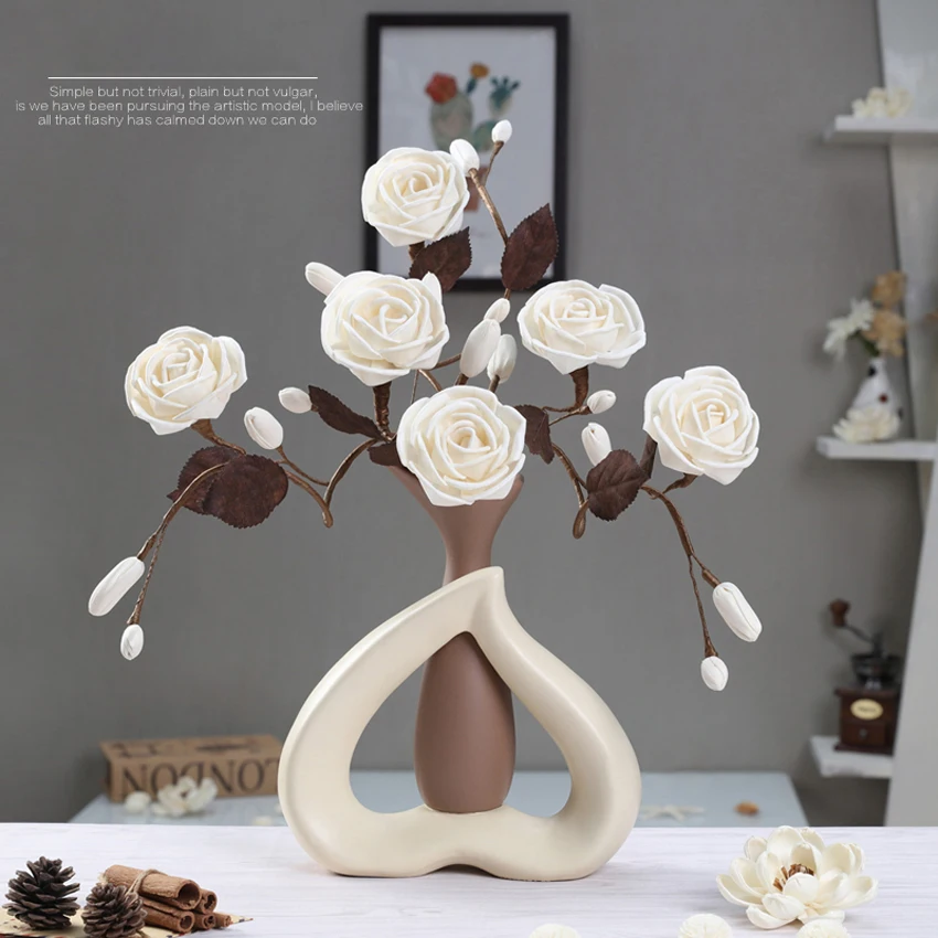 European Modern Simple Ceramic Flower Vase High-quality Decorative Vases Home decoration fashion Wedding Decoration Crafts.
European Modern Simple Ceramic Flower Vase High-quality Decorative Vases Home decoration fashion Wedding Decoration Crafts.
