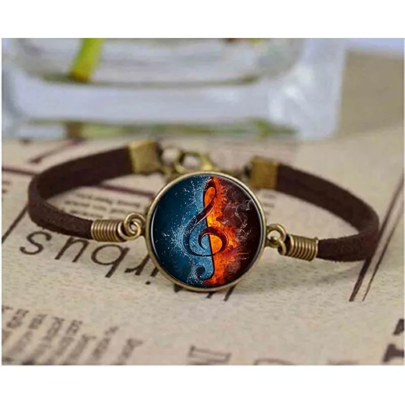 Free shipping fashion musical notes bracelet music is one half water and one half fire Zinc alloy Glass bracelet retro bracelets
Free shipping fashion musical notes bracelet music is one half water and one half fire Zinc alloy Glass bracelet retro bracelets