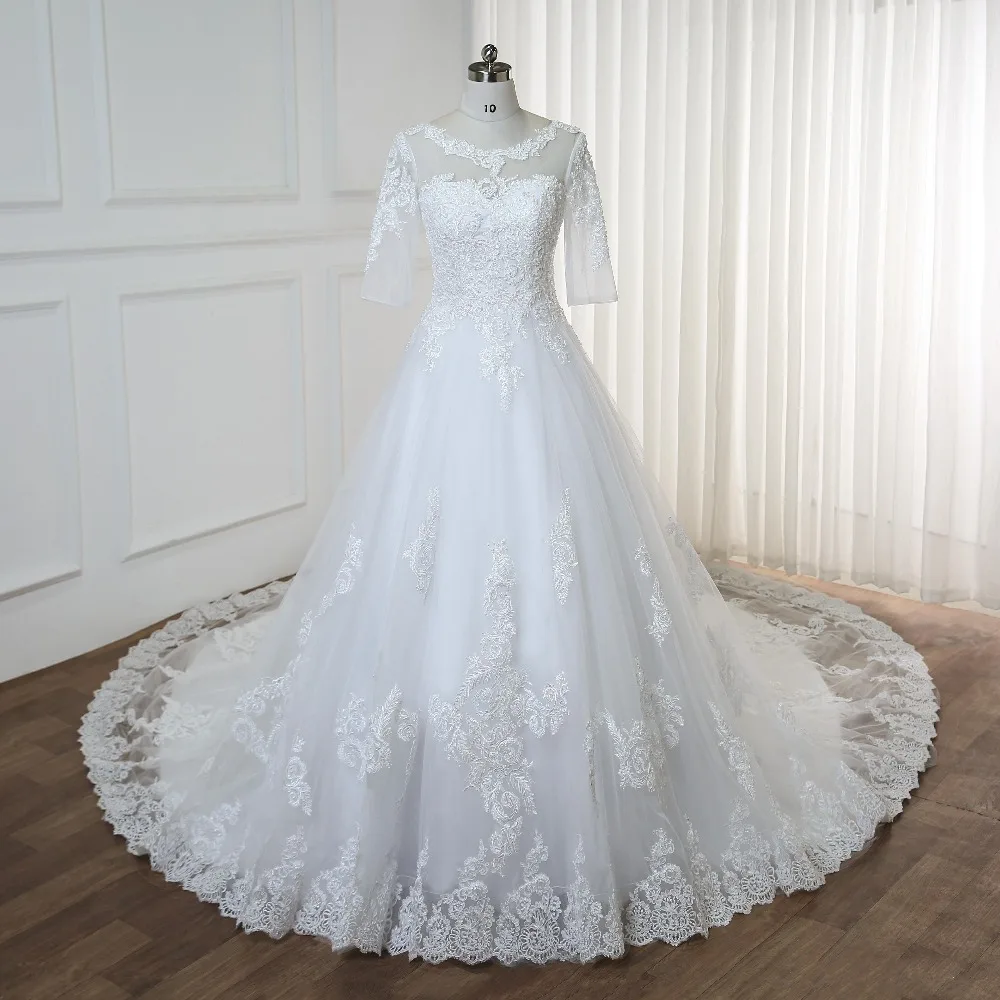 Luxury Lace Wedding dress 2021 Ball Gown Scoop Neck Half sleeve Pearl wedding Dresses Vestido de Noiva Bridal Gown Long Tail
Luxury Lace Wedding dress 2021 Ball Gown Scoop Neck Half sleeve Pearl wedding Dresses Vestido de Noiva Bridal Gown Long Tail