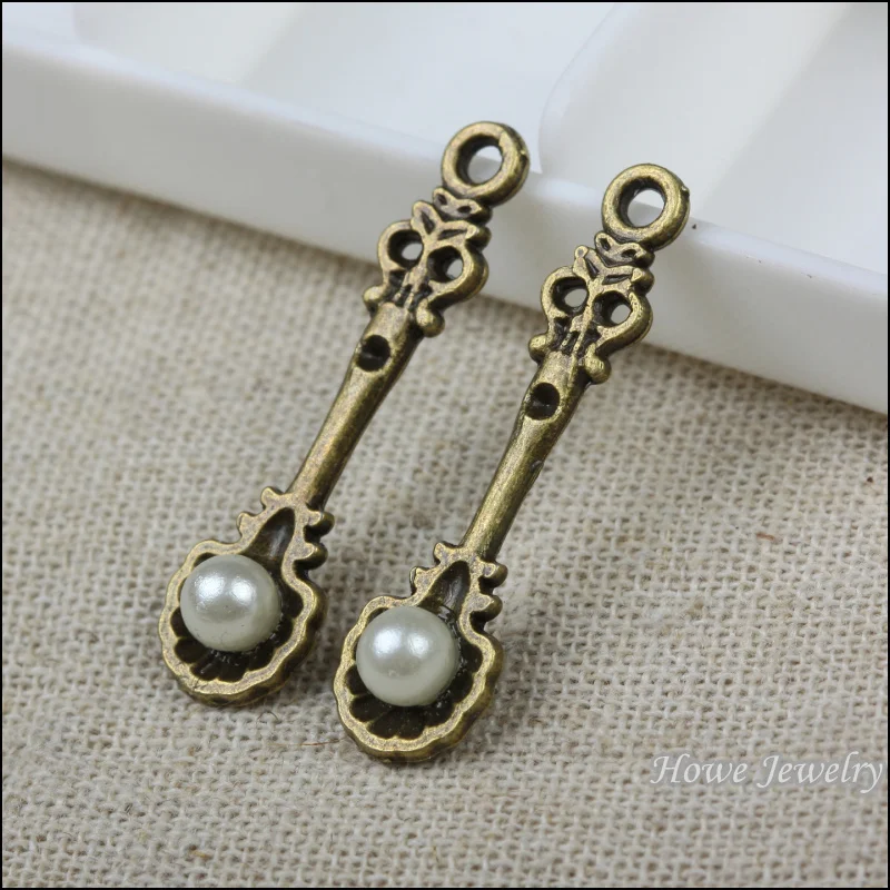 75pcs vintage spoon with imitation pearl charm antique bronze fit for fashion earrings and maxi Necklaces & Pendants
75pcs vintage spoon with imitation pearl charm antique bronze fit for fashion earrings and maxi Necklaces & Pendants